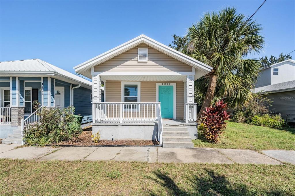 front view of house with a yard