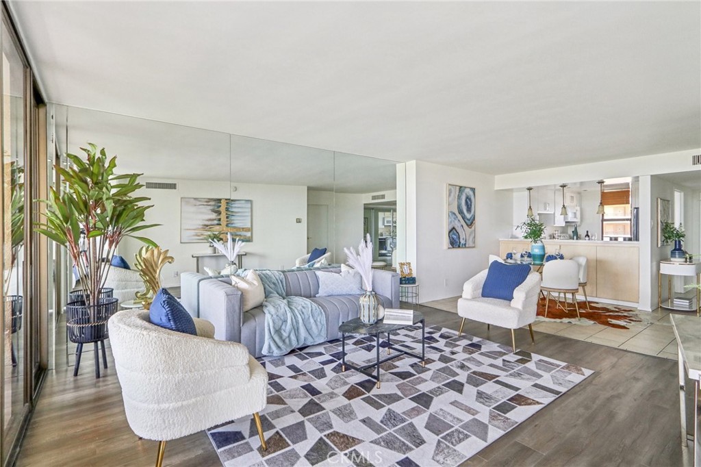 a living room with furniture and a rug