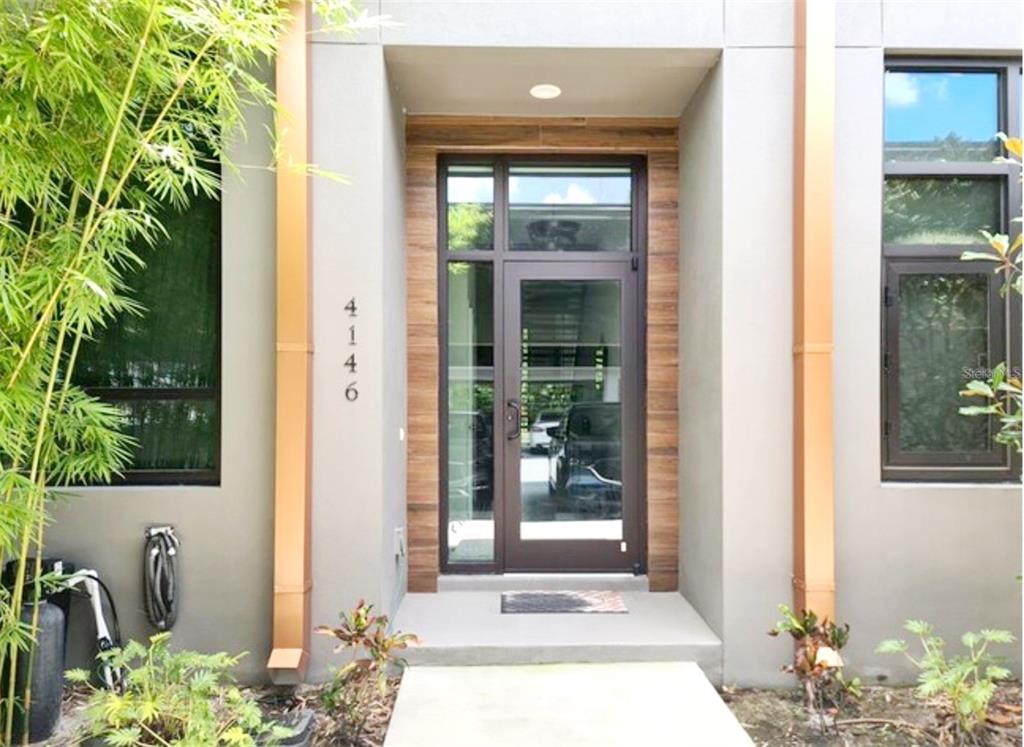 a view of a door front of a house