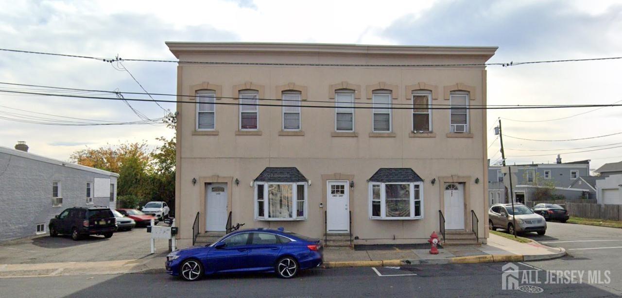 a car parked in front of a building