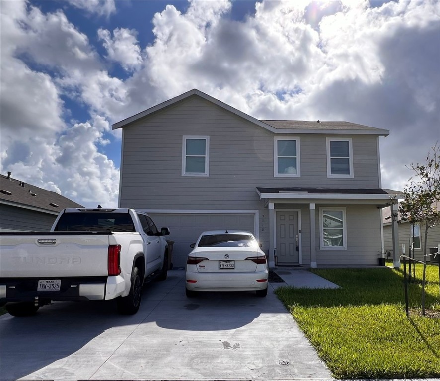 a car parked in front of a house