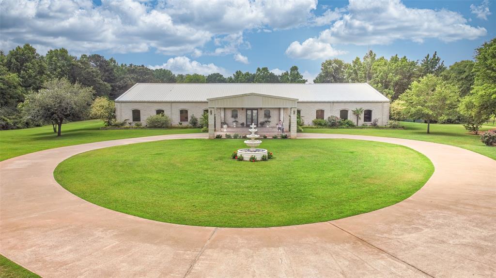 a view of a house with swimming pool