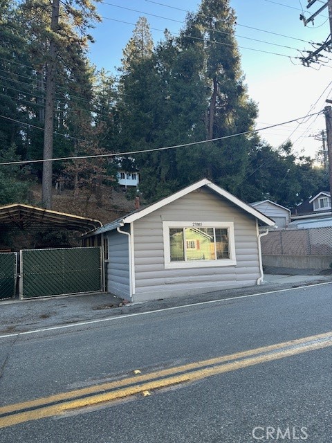 a view of house with trees in the background