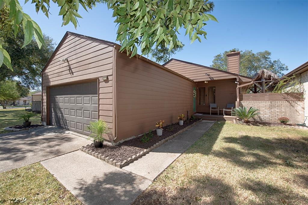 Gorgeous patio home with inviting walkway and great curb appeal.