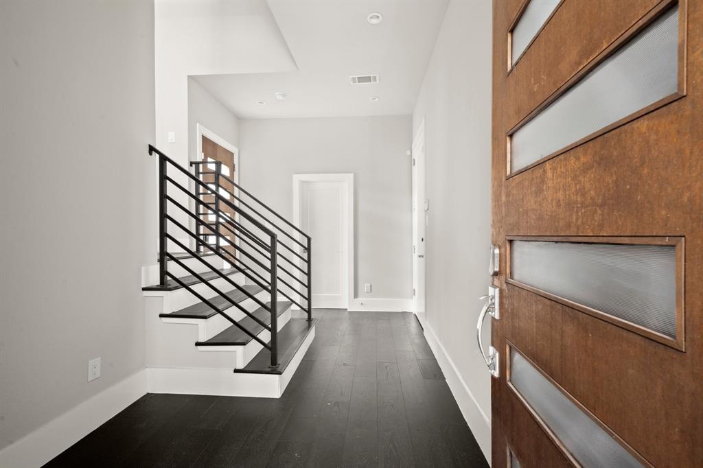 a view of a hallway with staircase