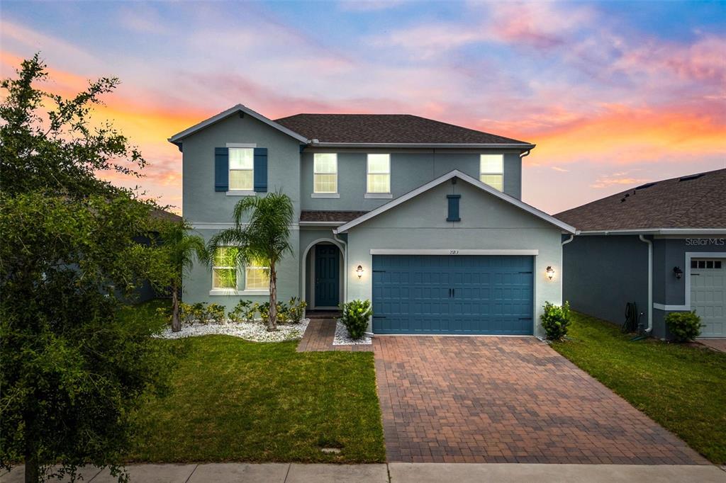 front view of house with a yard