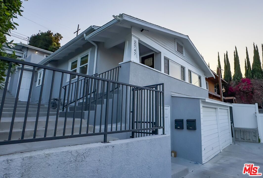 a view of a house with a garage