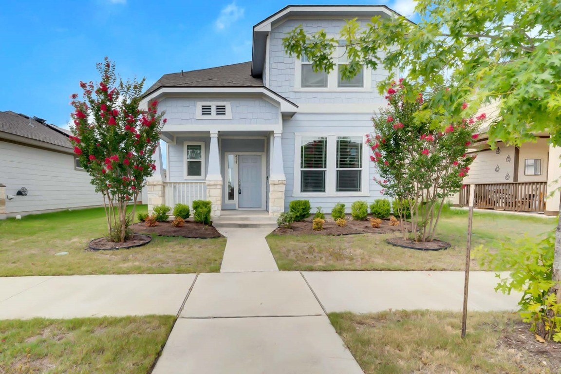 a front view of house with yard