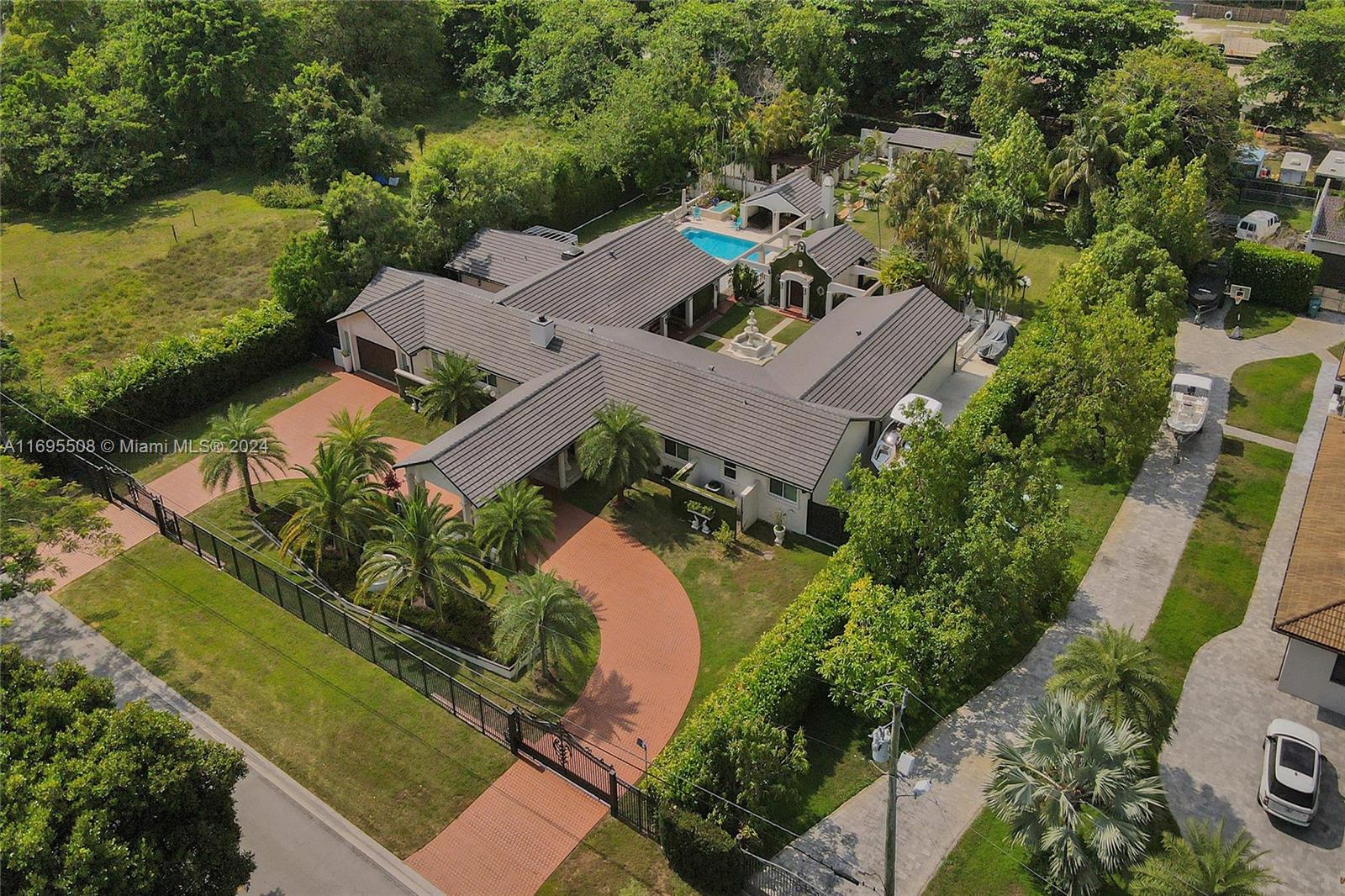 an aerial view of a house with a garden