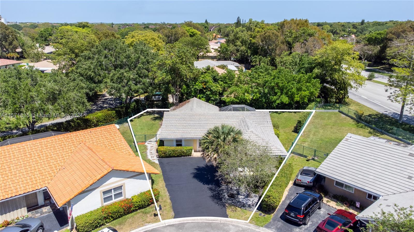 an aerial view of a house with outdoor space