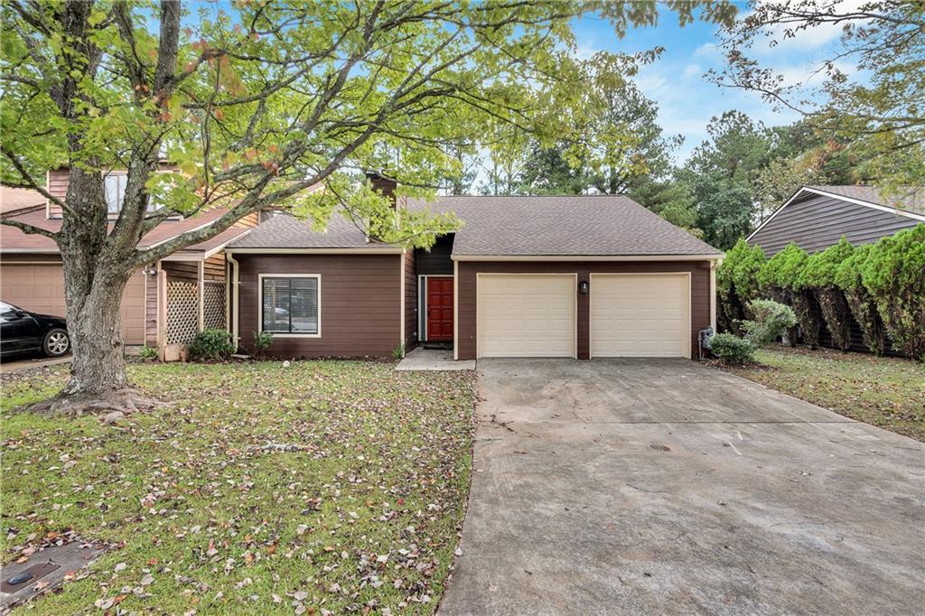 a house with trees in front of it