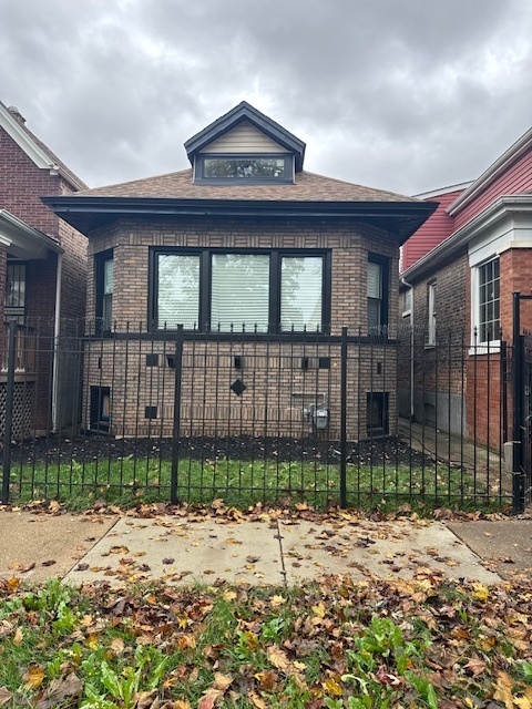 a front view of a house with a porch