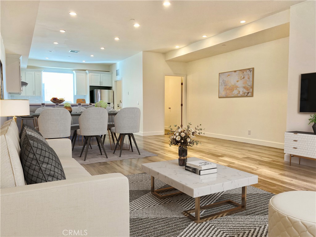 a living room with furniture and a table