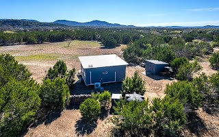 a view of a house with a mountain yard