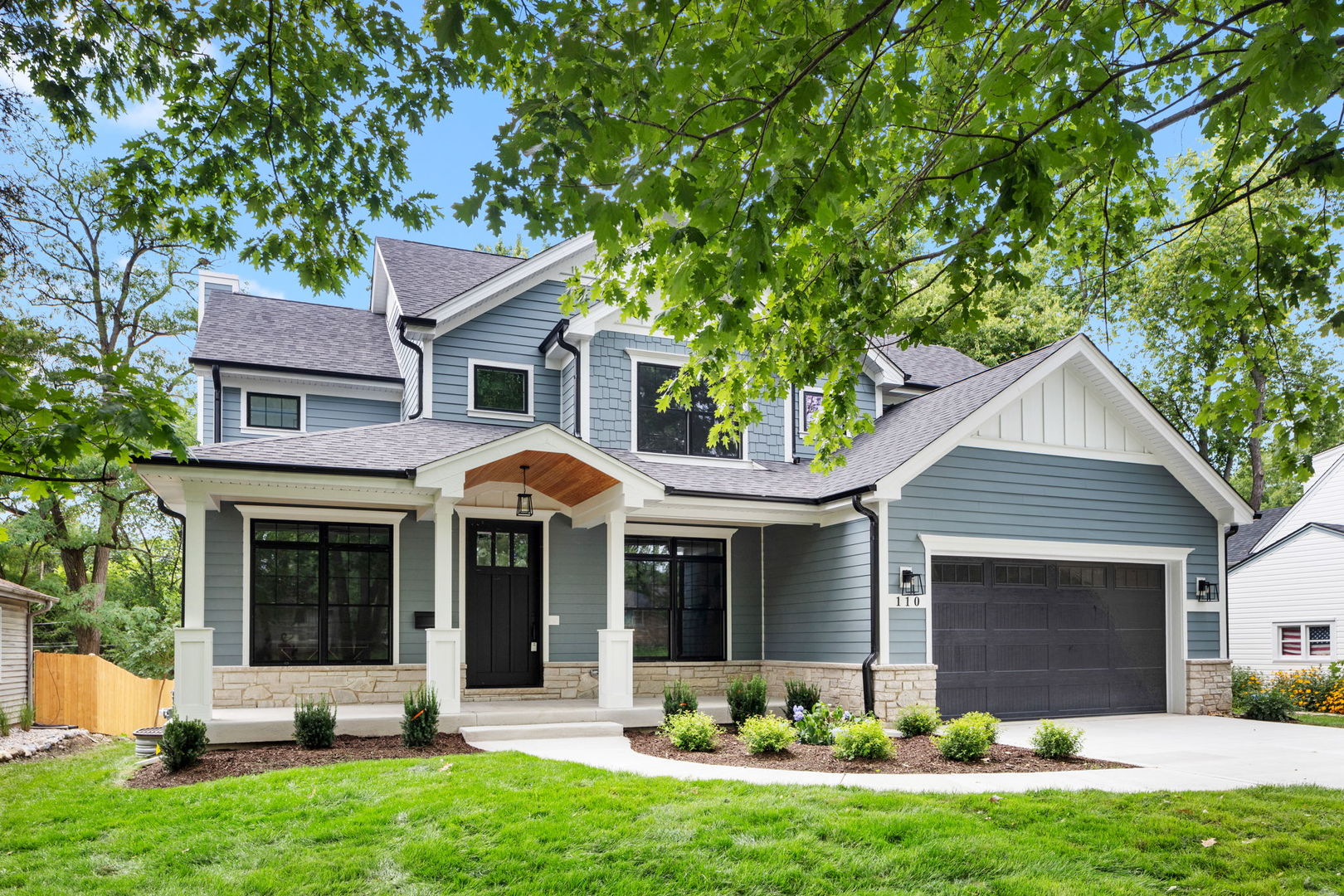 front view of a house with a yard