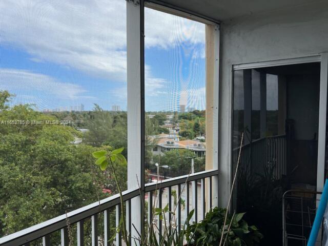 a view of a balcony with an outdoor space