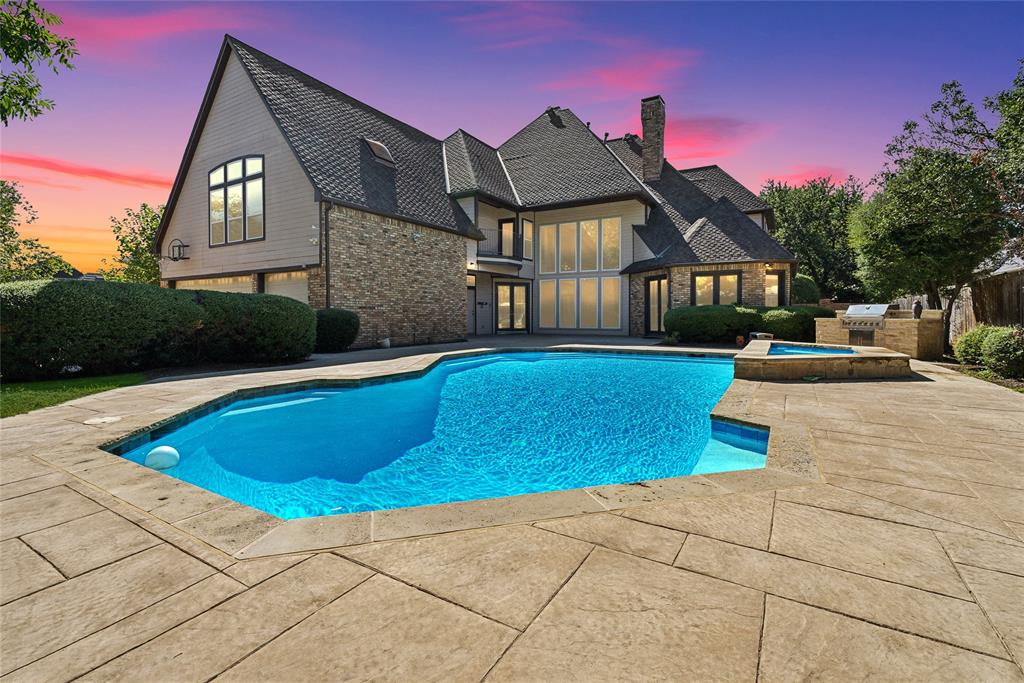 a view of a house with swimming pool