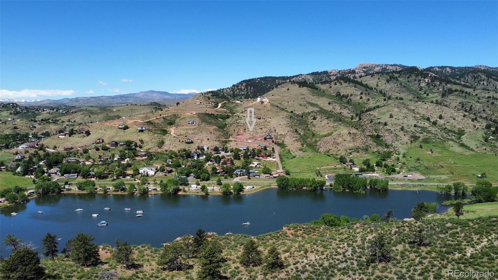 a view of a lake with a mountain in the background