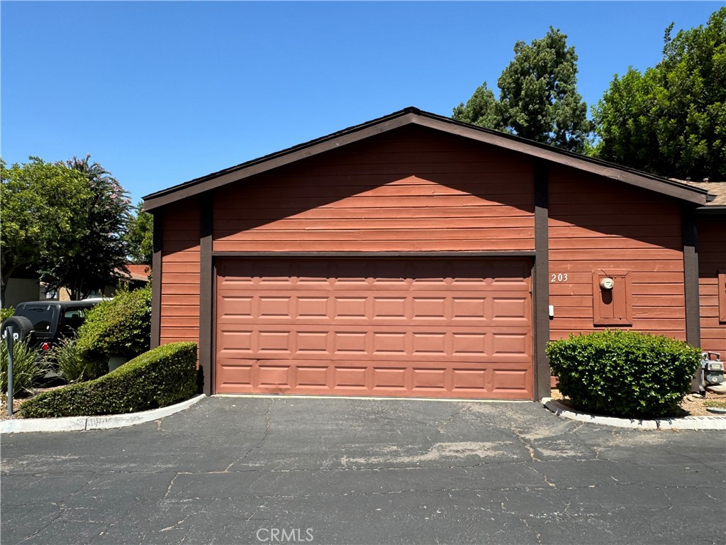 a front view of a house with a garage