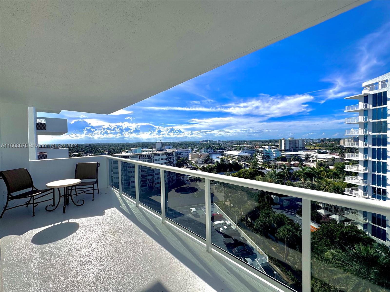 a view of a balcony with chairs