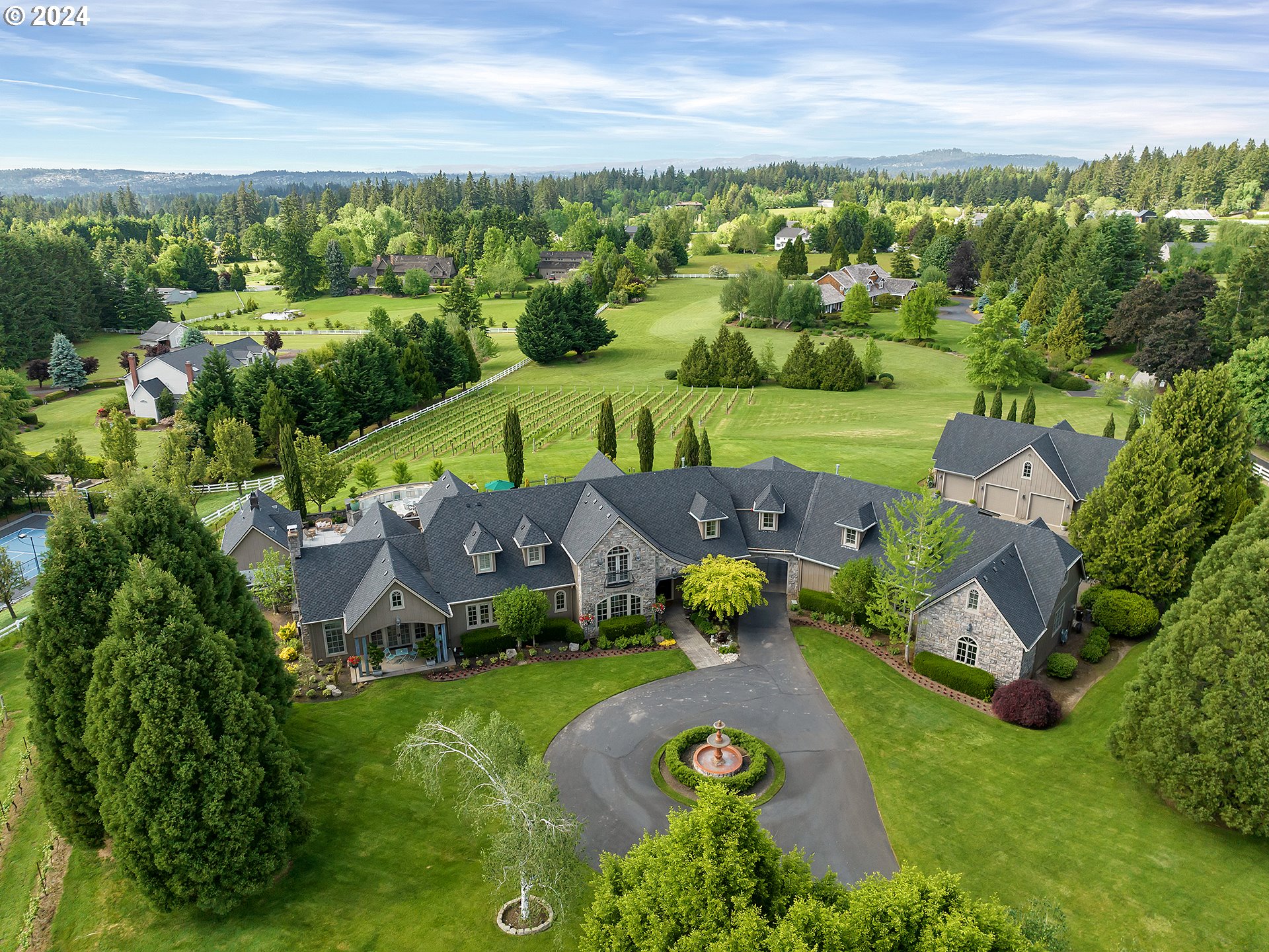 an aerial view of a house with garden space and outdoor space