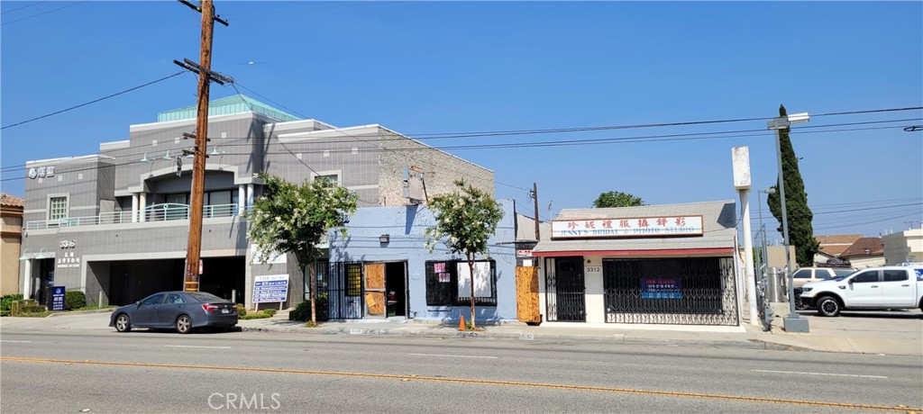 a view of a building with a street