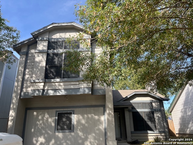 a view of a yard of a house