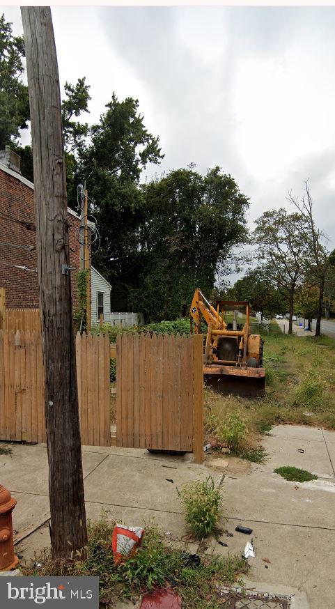 a view of a backyard with trees