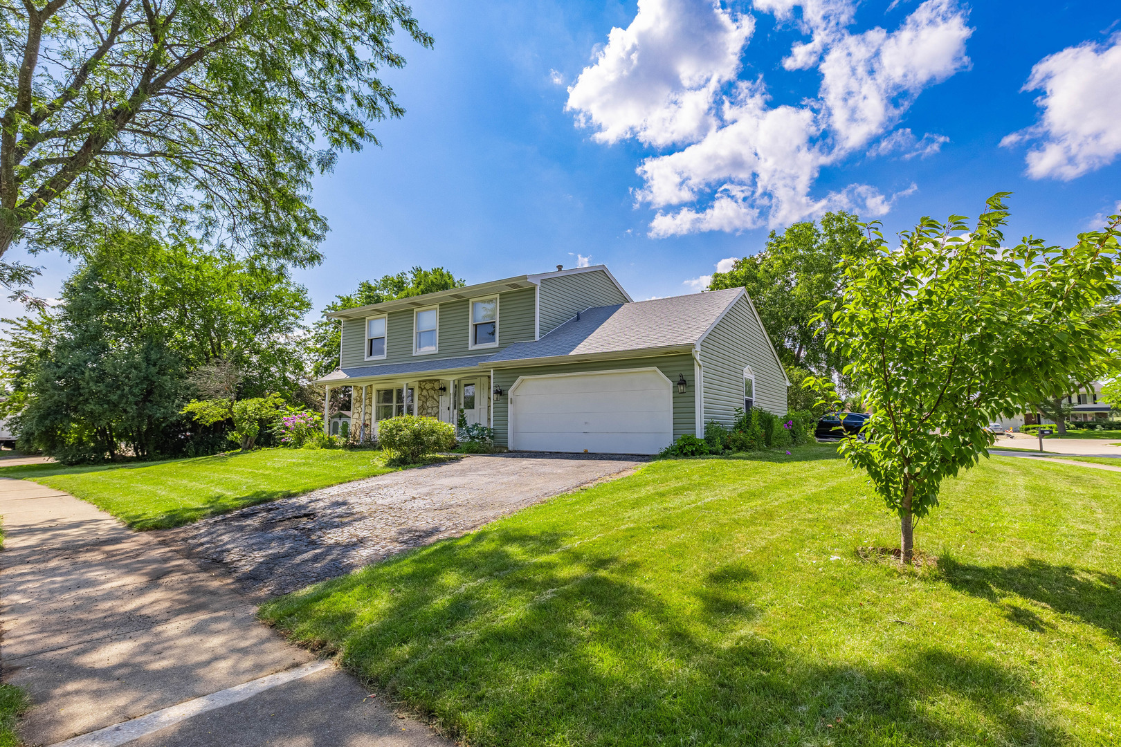 a house view with a garden space