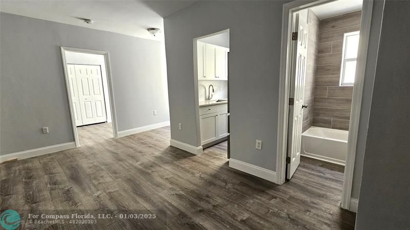 a view of entryway with wooden floor