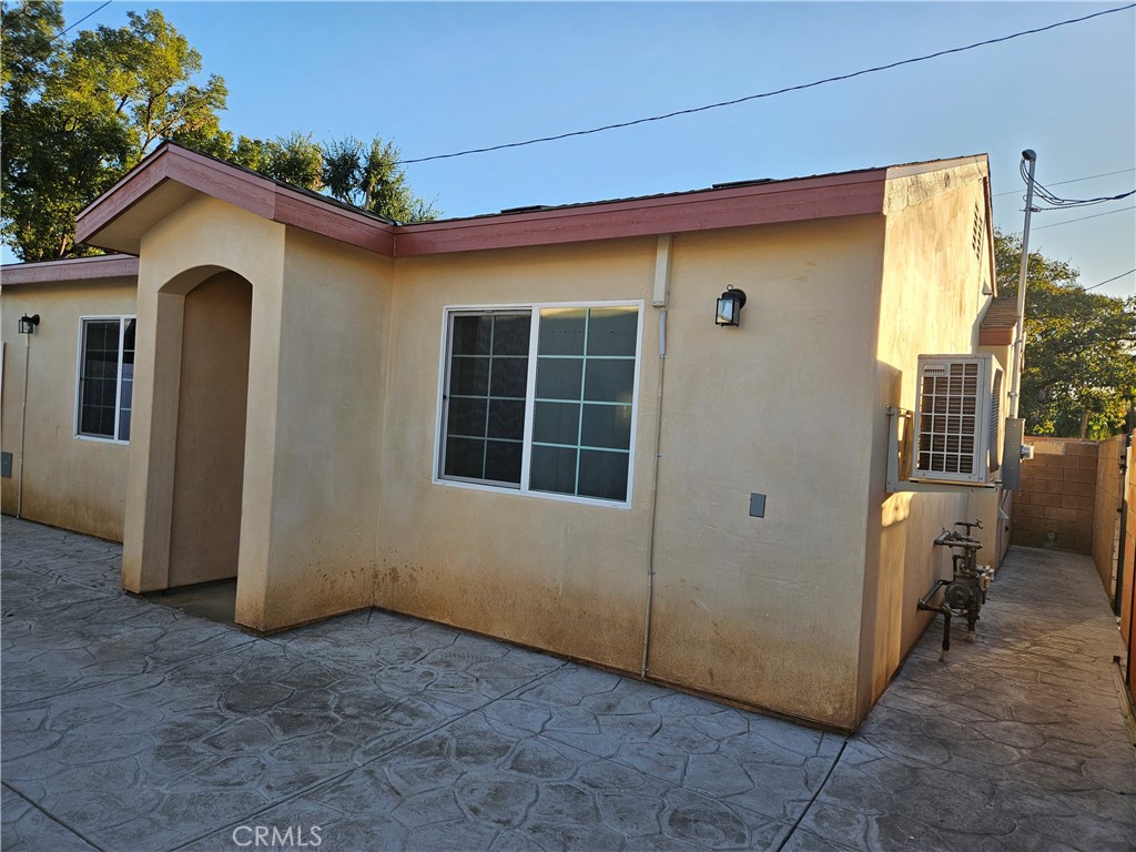 a view of front door and yard