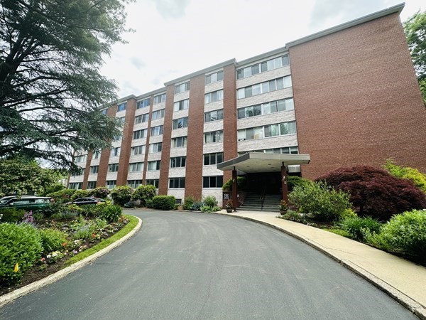 a view of a building with a garden