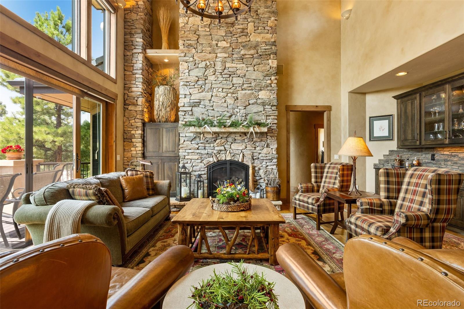 a living room with furniture fireplace and flat screen tv