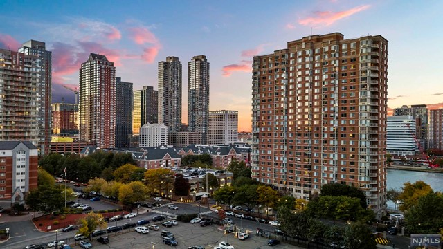 a view of a city with tall buildings