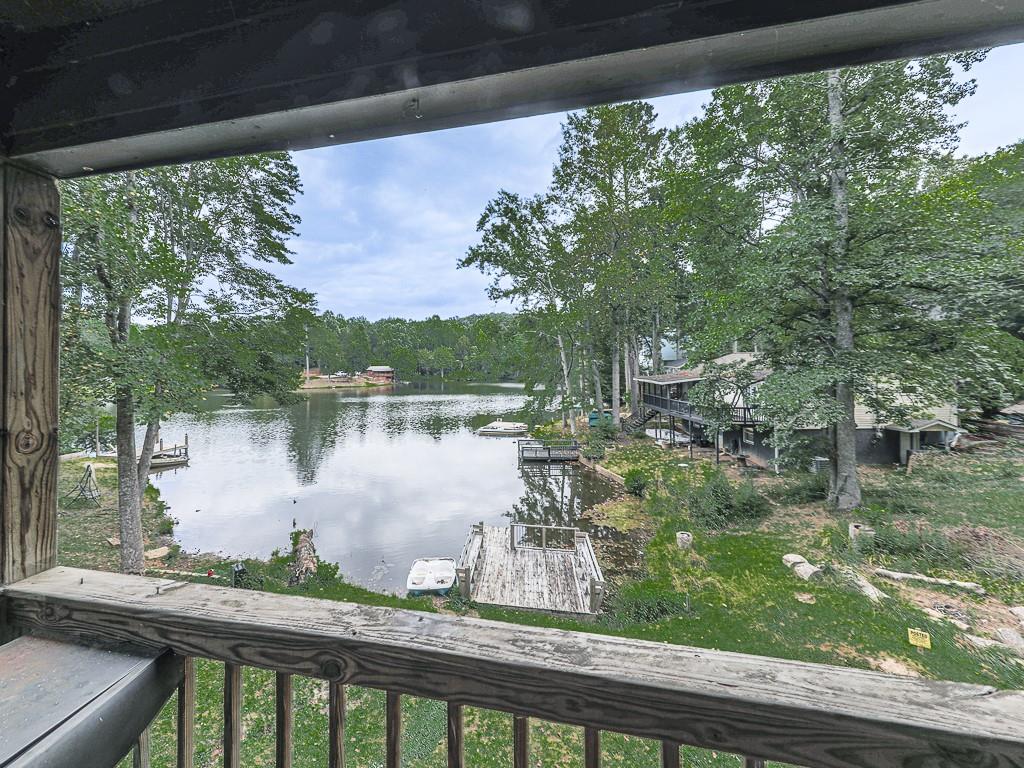 a view of a lake from a balcony