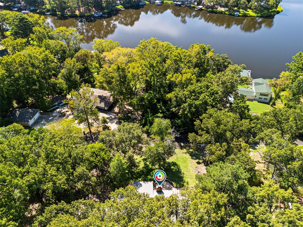 a backyard of a house with a lake view and a lake view