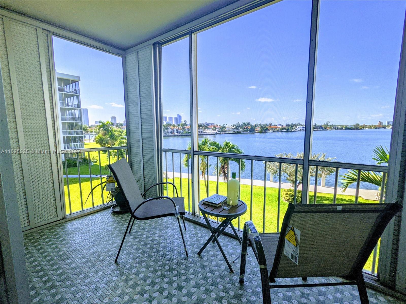 a view of a chairs and table in patio