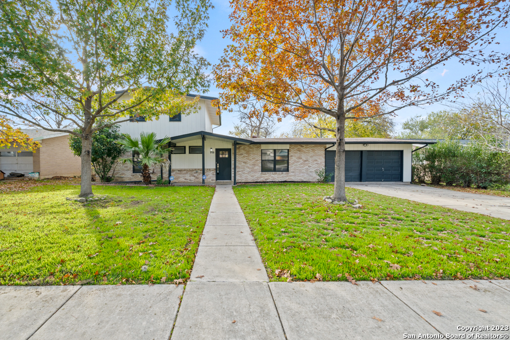 a front view of house with yard