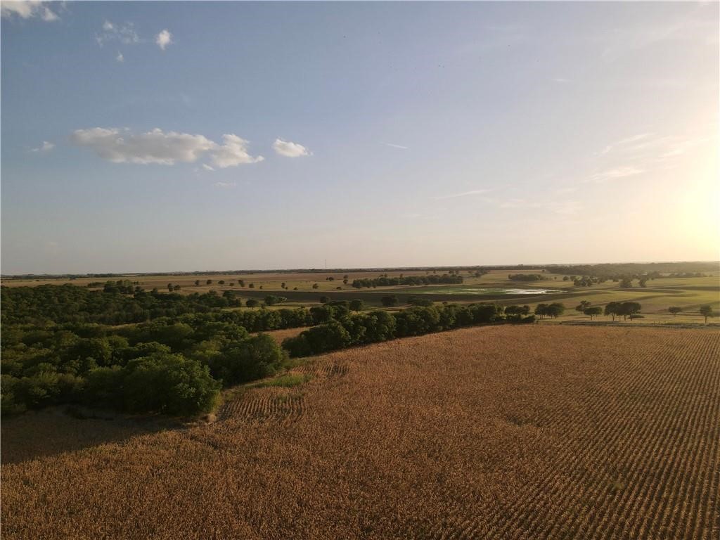 a view of a lake and green space