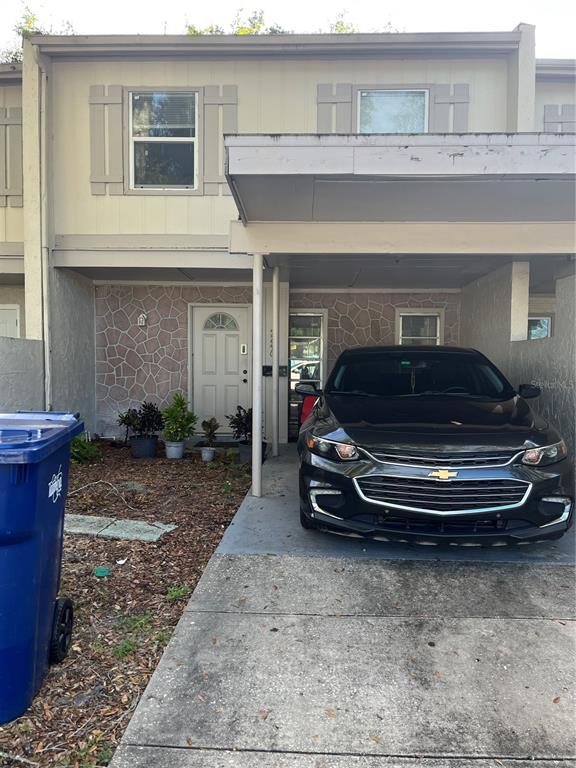 a car parked in front of a house