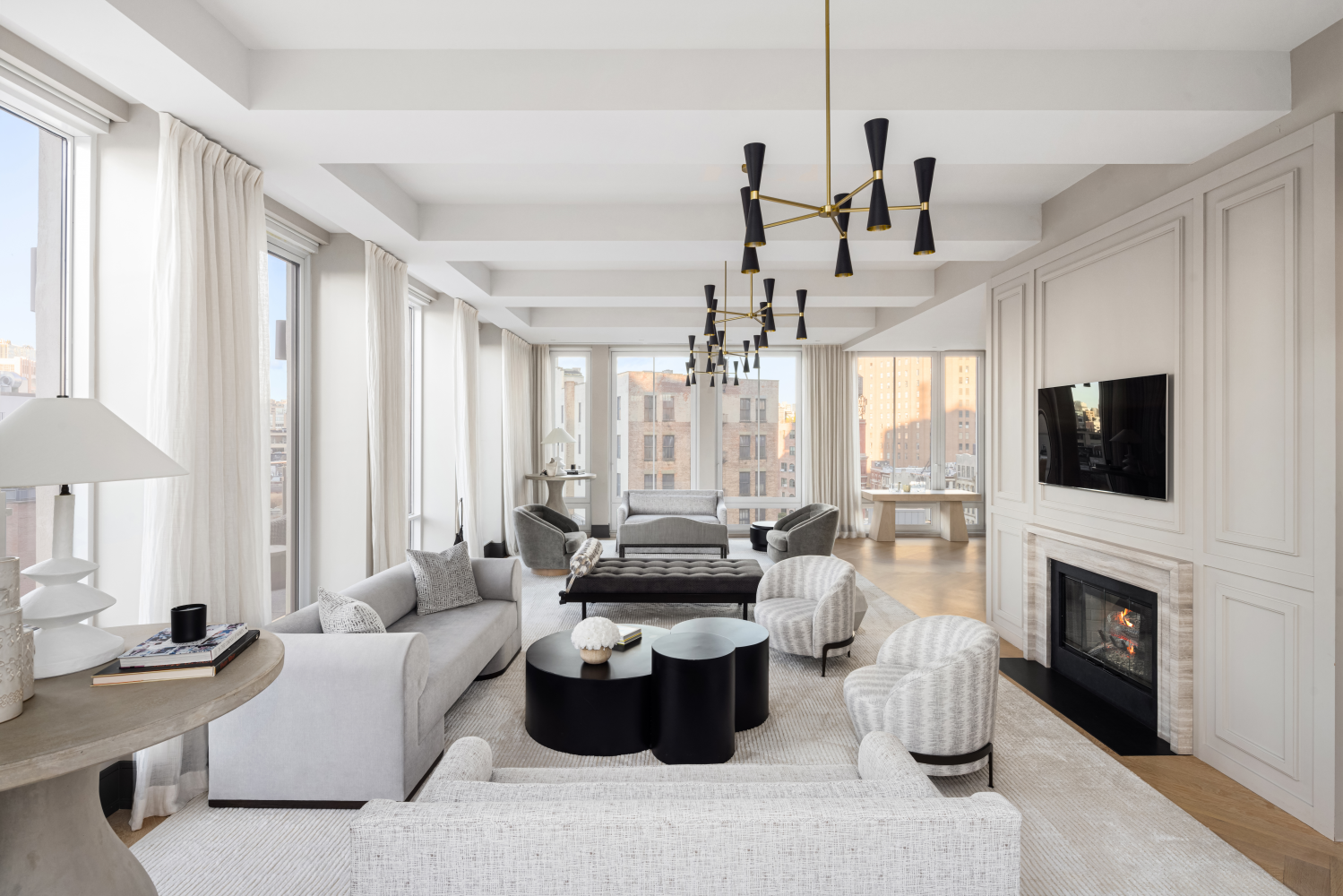 a living room with furniture fireplace and a flat screen tv