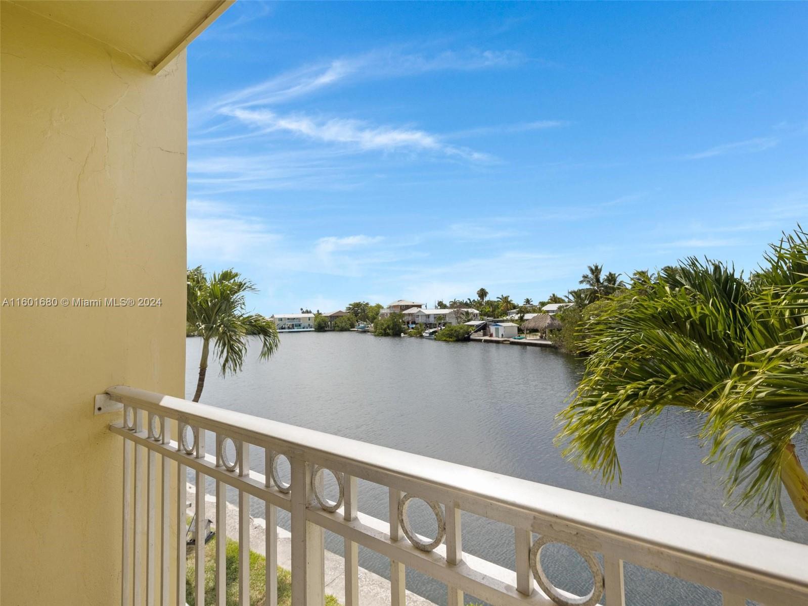 a view of a lake from a balcony