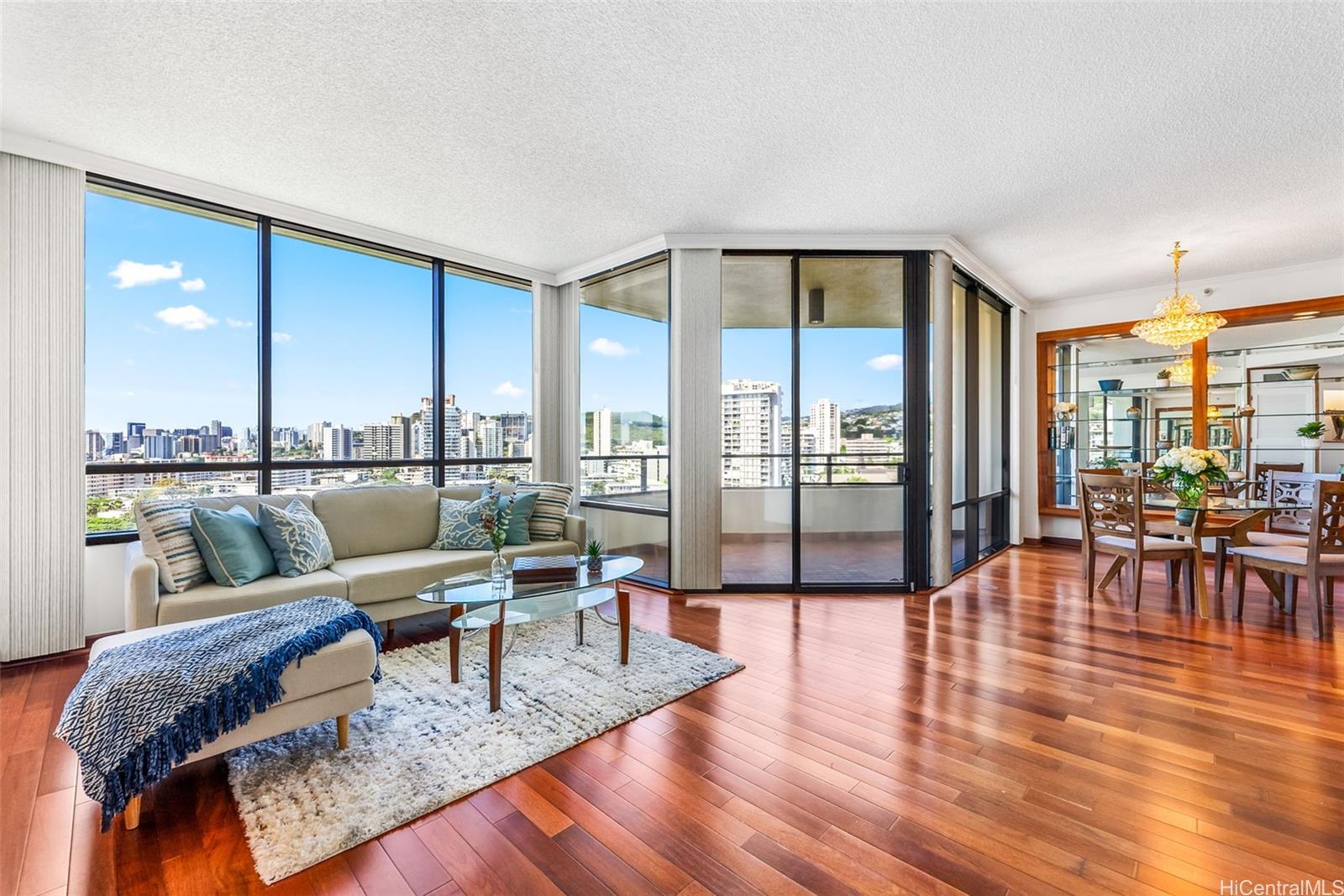 a living room with furniture and a table