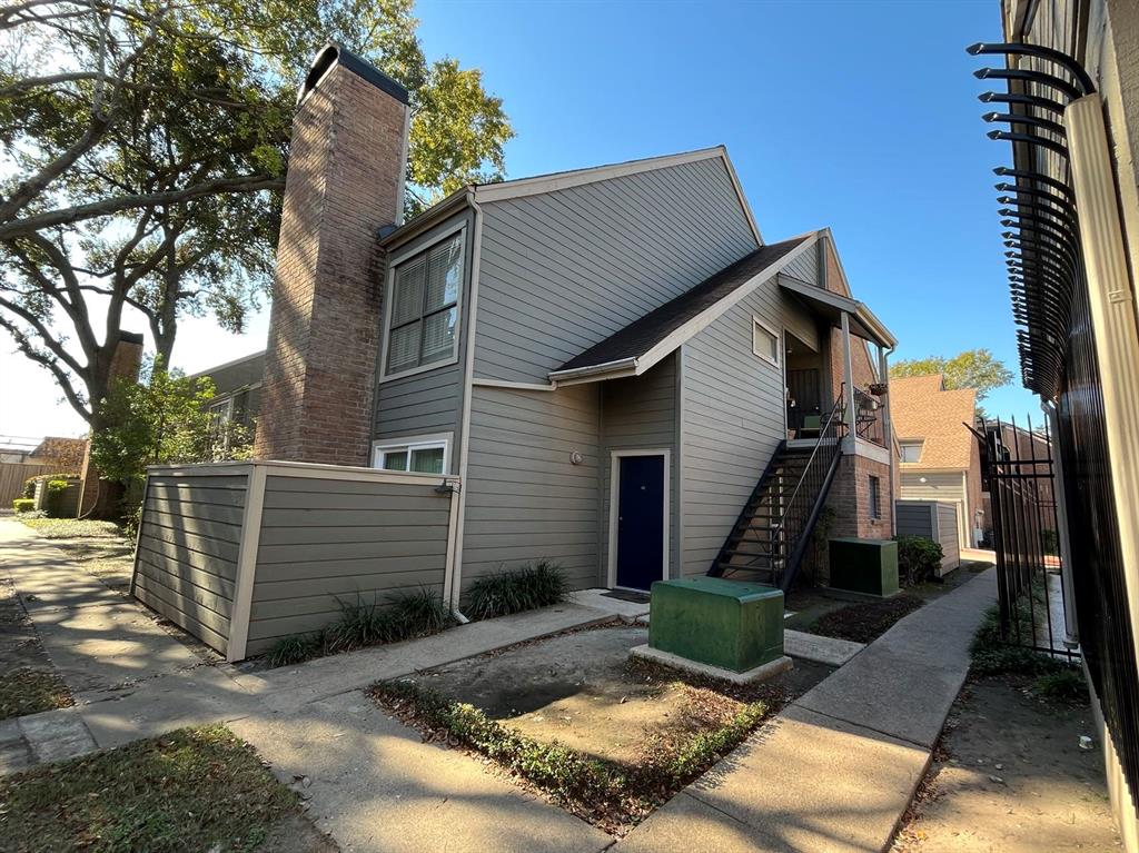 a front view of a house with garage