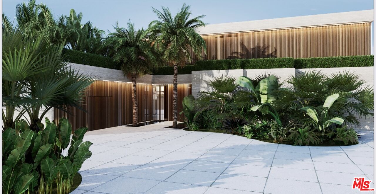 a view of potted plants in front of a house