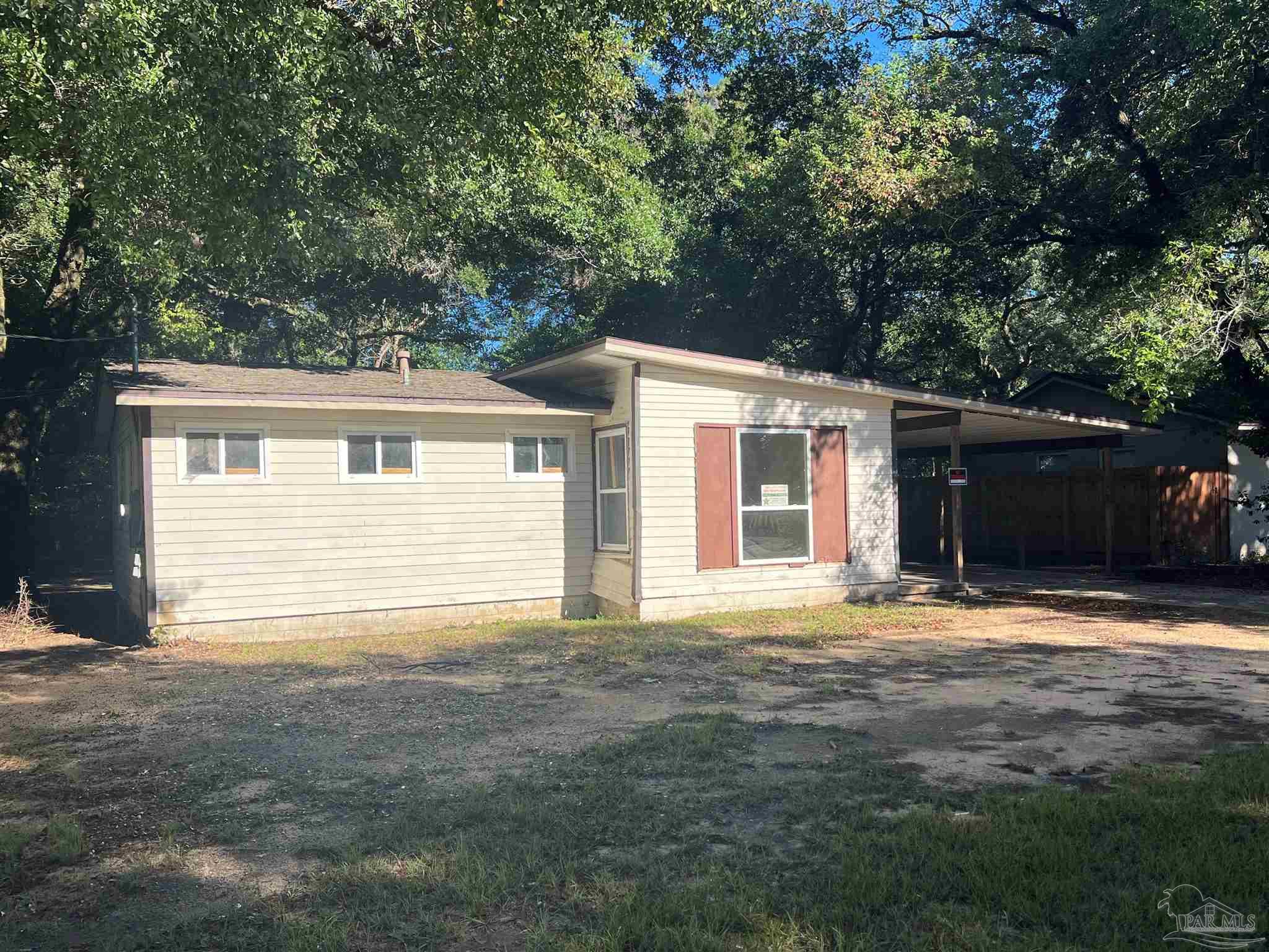 a front view of a house with a garage