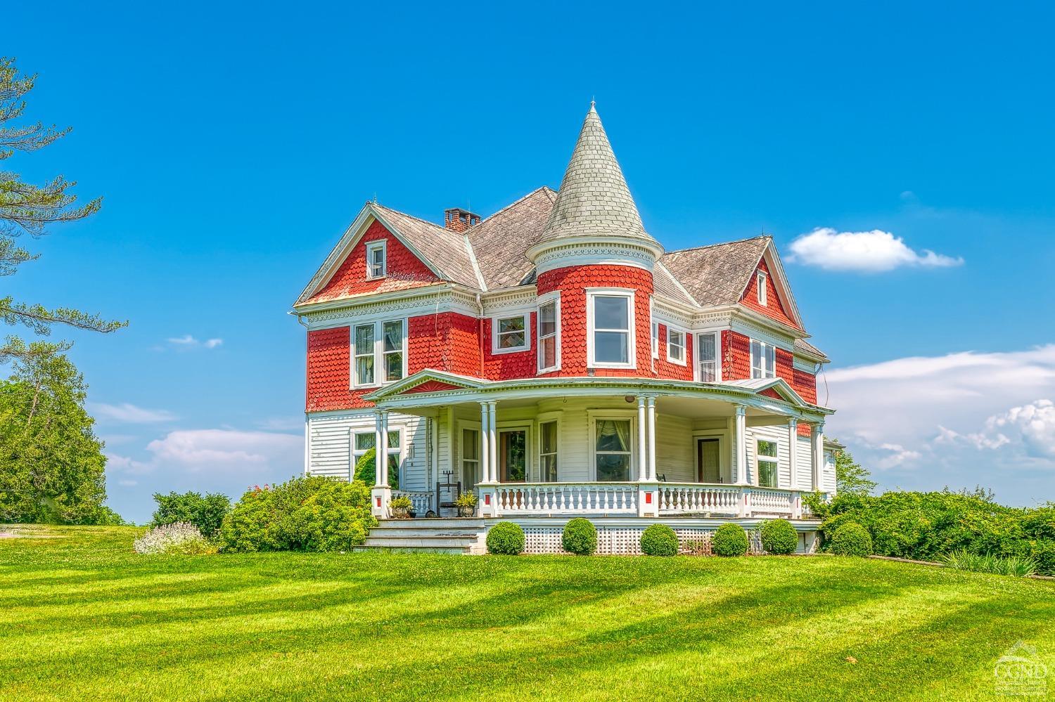 a front view of the house with a yard