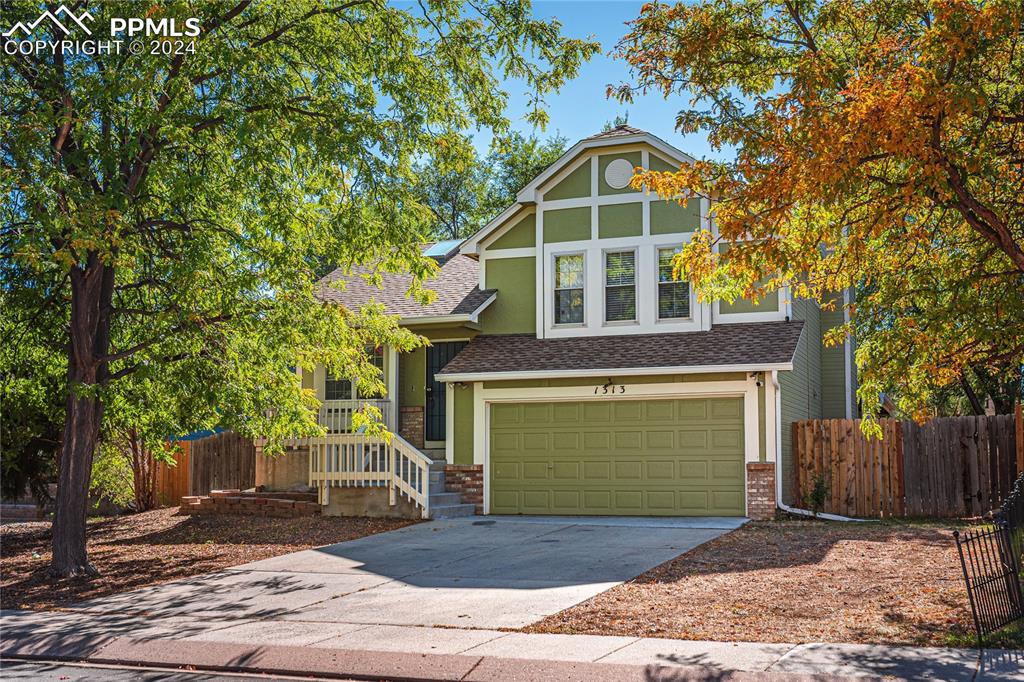 Tudor home featuring a garage