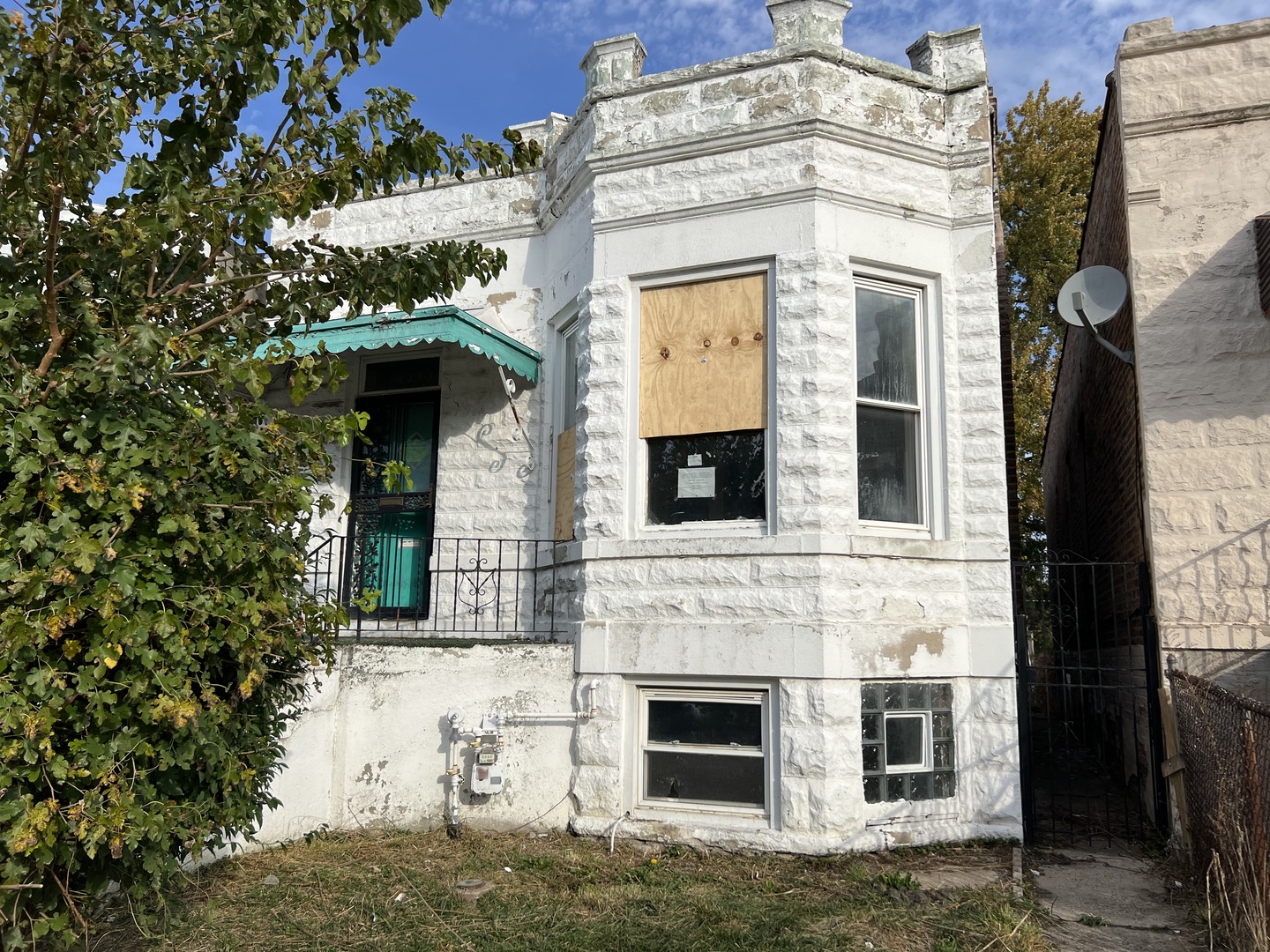 a building with a clock on the top door