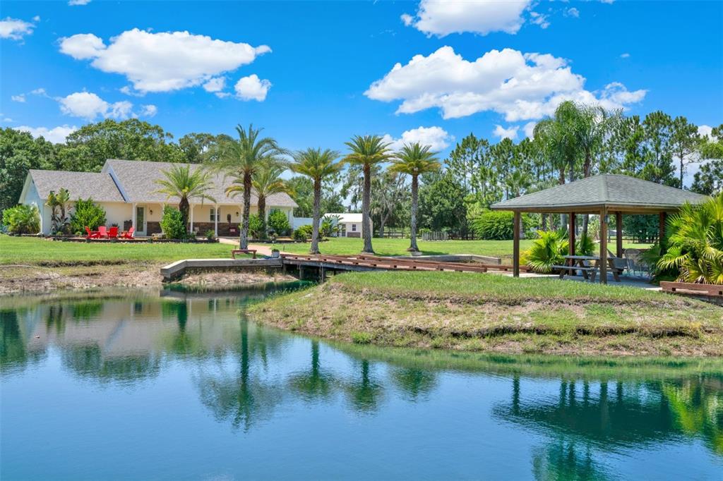 a view of a lake with a house